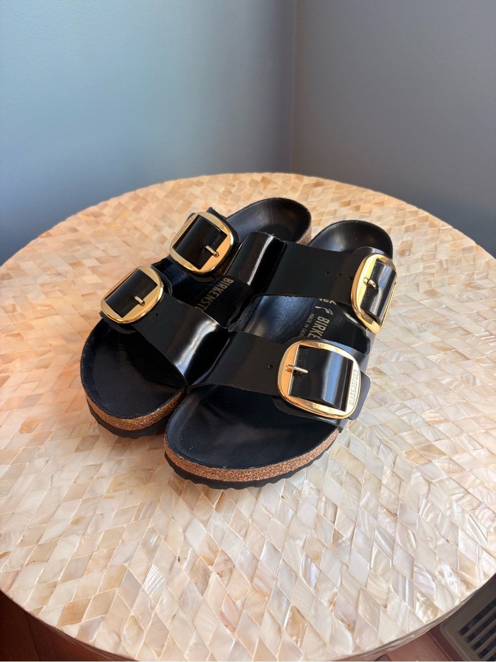 Birkenstock Black Patent Two-Strap Sandals with Gold Buckles